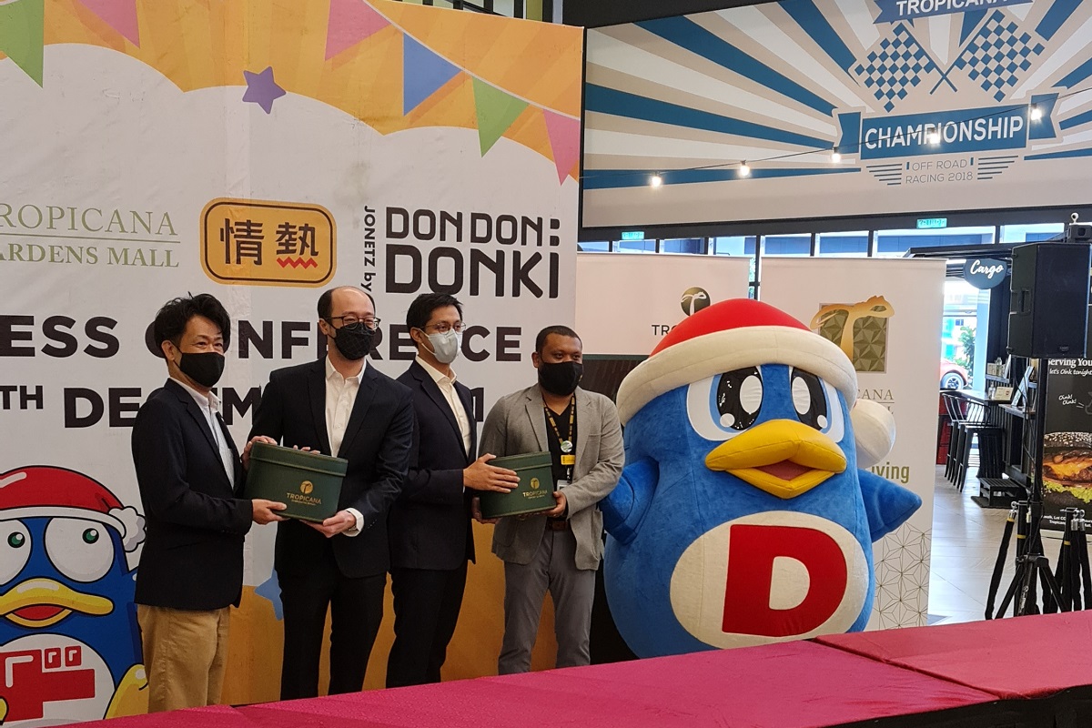 (From left) Satoshi, Tan, Tropicana Corp group executive director Jared Ethan Ang and JONETZ by Don Don Donki senior store manager Sivaneswaran with Donpen, the store mascot, at the media event on Thursday (Dec 9).